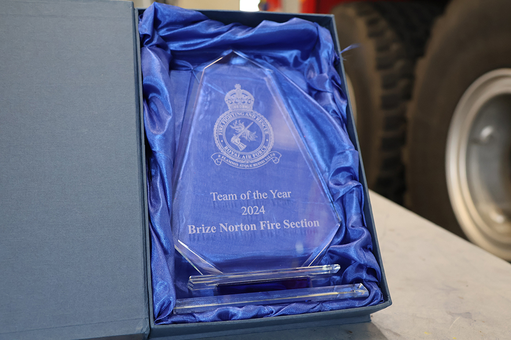 Image showing the glass award, which is a stylised spearhead shape, upon which, RAF Firefighting and Rescue badge, and the words, 'Team of the Year 2024 Brize Norton Fire Section', are engraved.